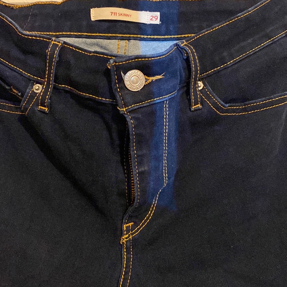 Levis skinny. Dark wash, no distress.